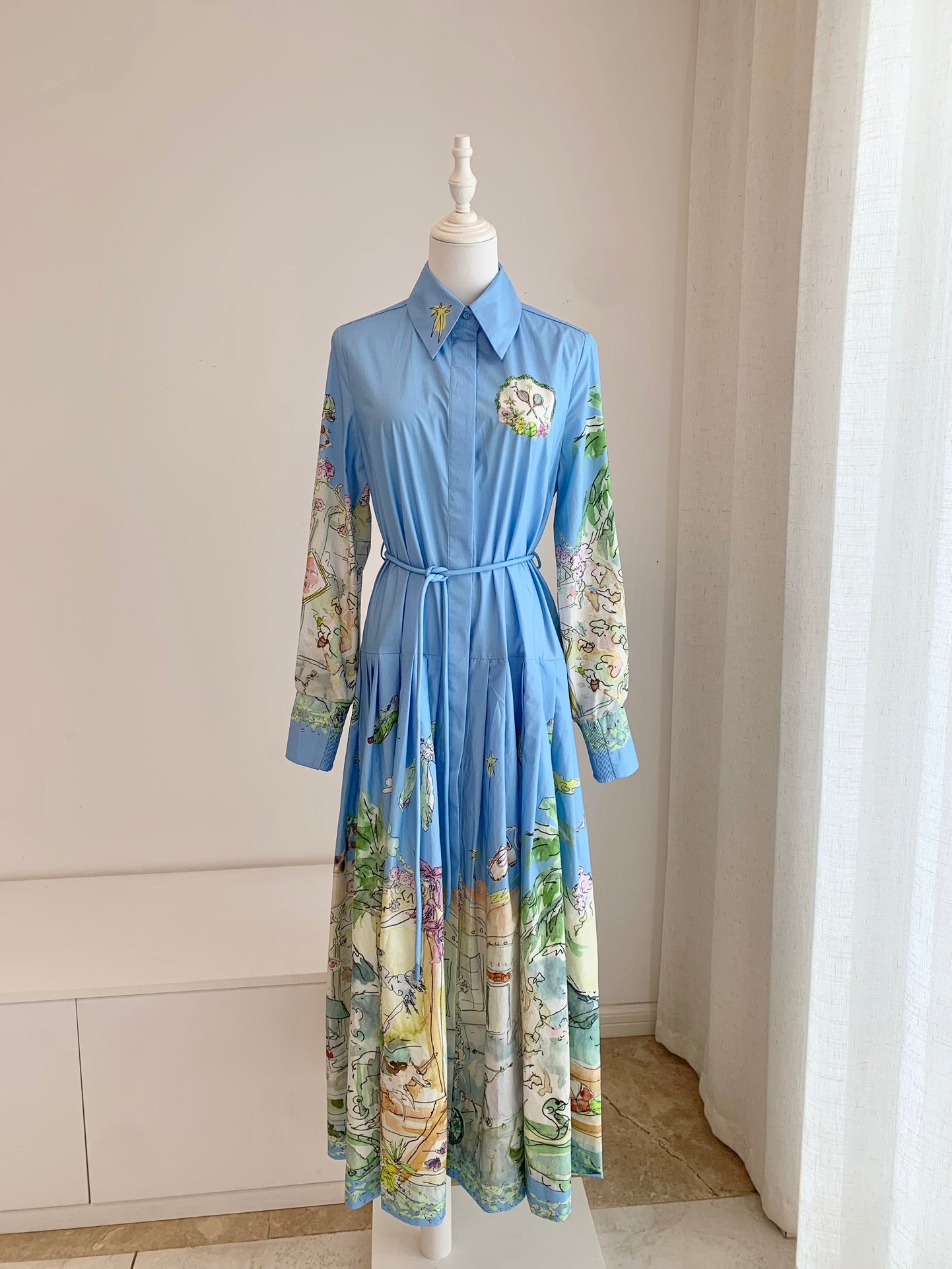 Alemais cotton dress light blue graphic print pleated skirt long sleeves front button belt waist 2507028AL