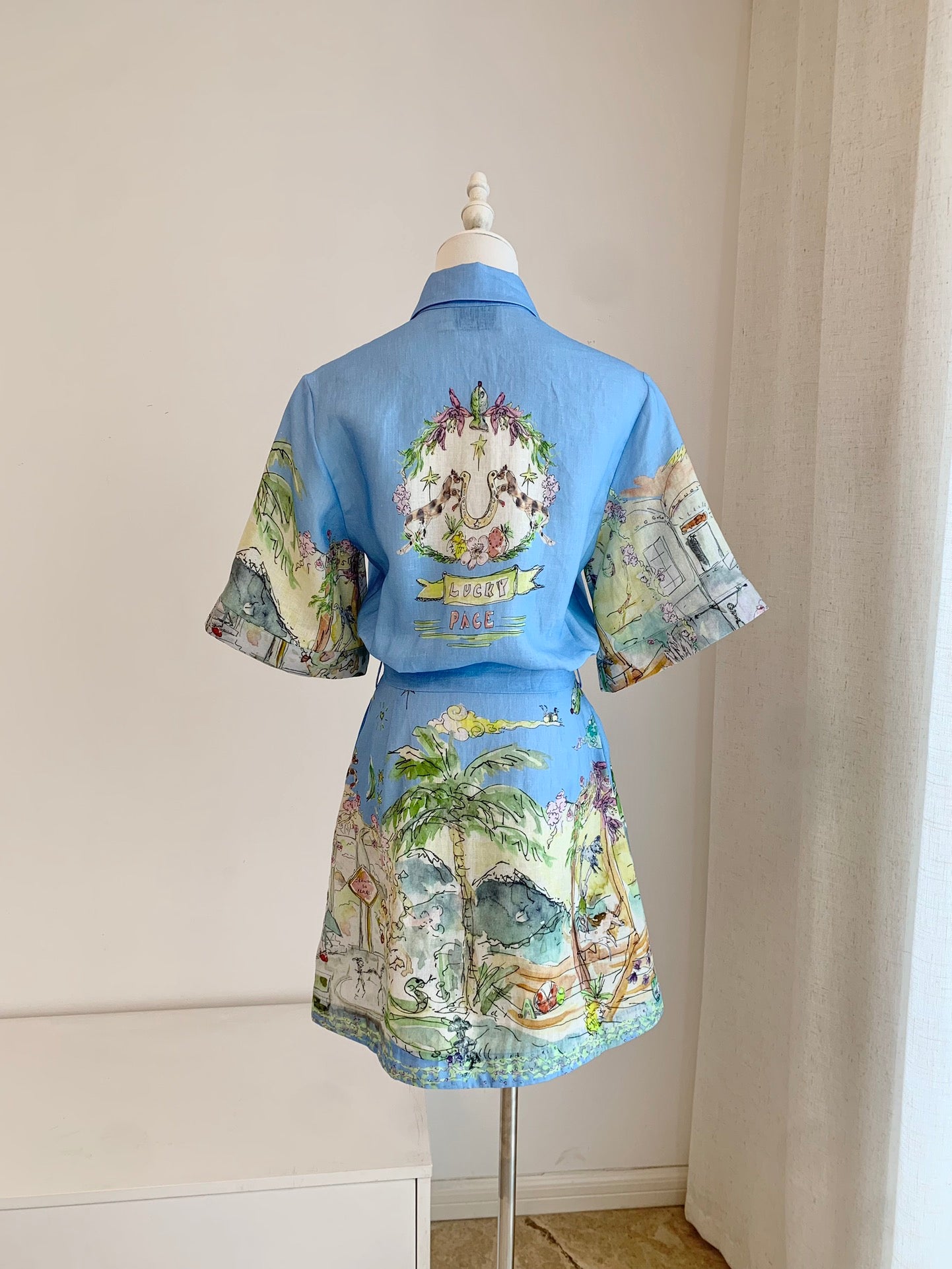Alemais linen printed dress light blue all-over print short sleeves front buttoned waist strap 2507029AL