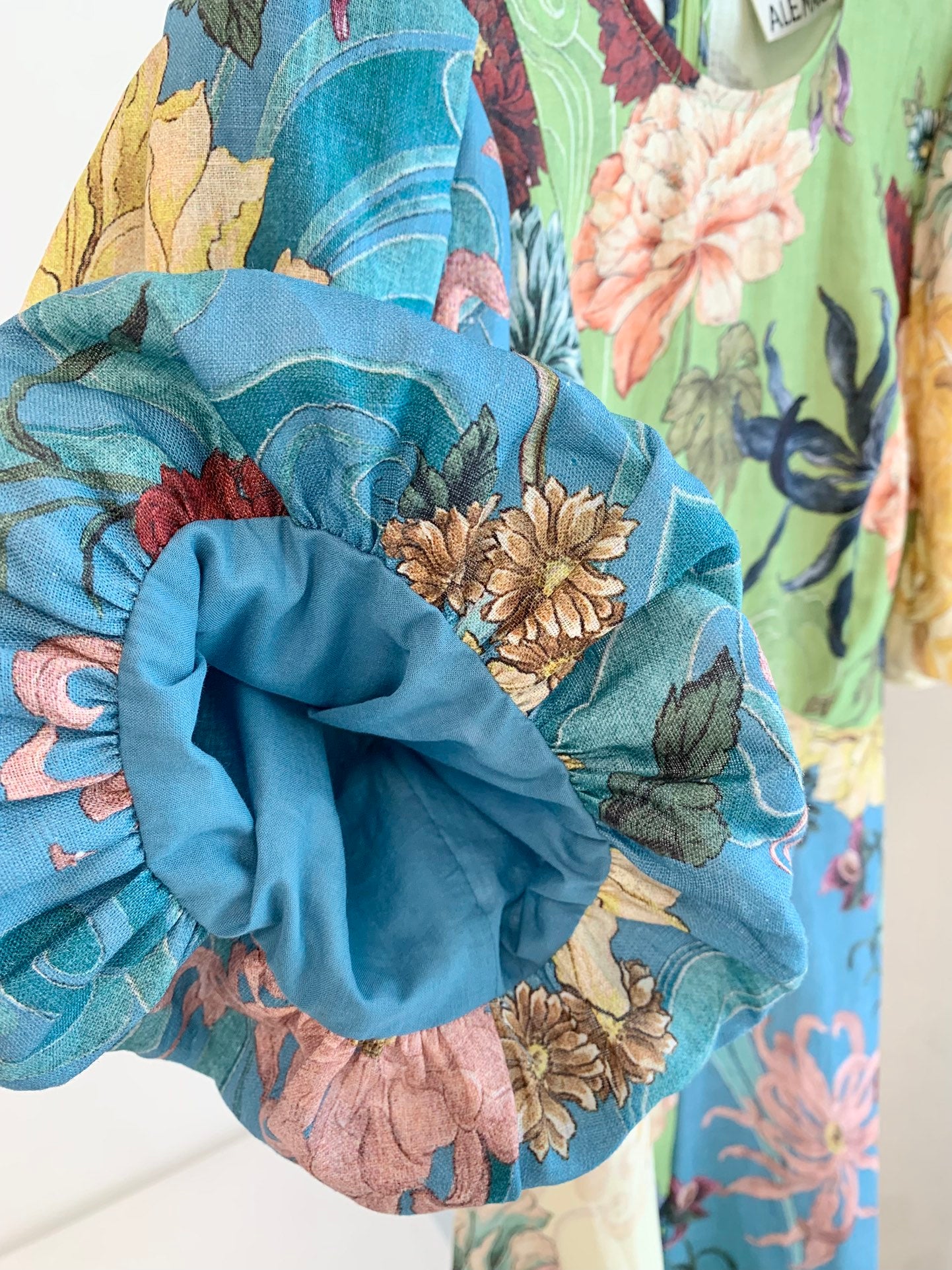 Alemais Avery midi dress light green rear zip floral print short puff sleeves flared linen 2507061AL