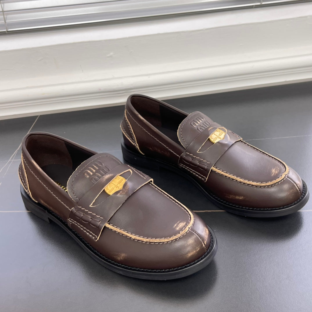 2502005MIU Miu leather penny loafers rubbing-brown khaki low heels round toe flat rubber sole