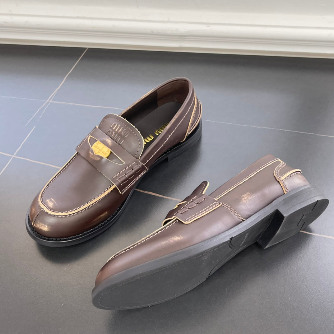 2502005MIU Miu leather penny loafers rubbing-brown khaki low heels round toe flat rubber sole