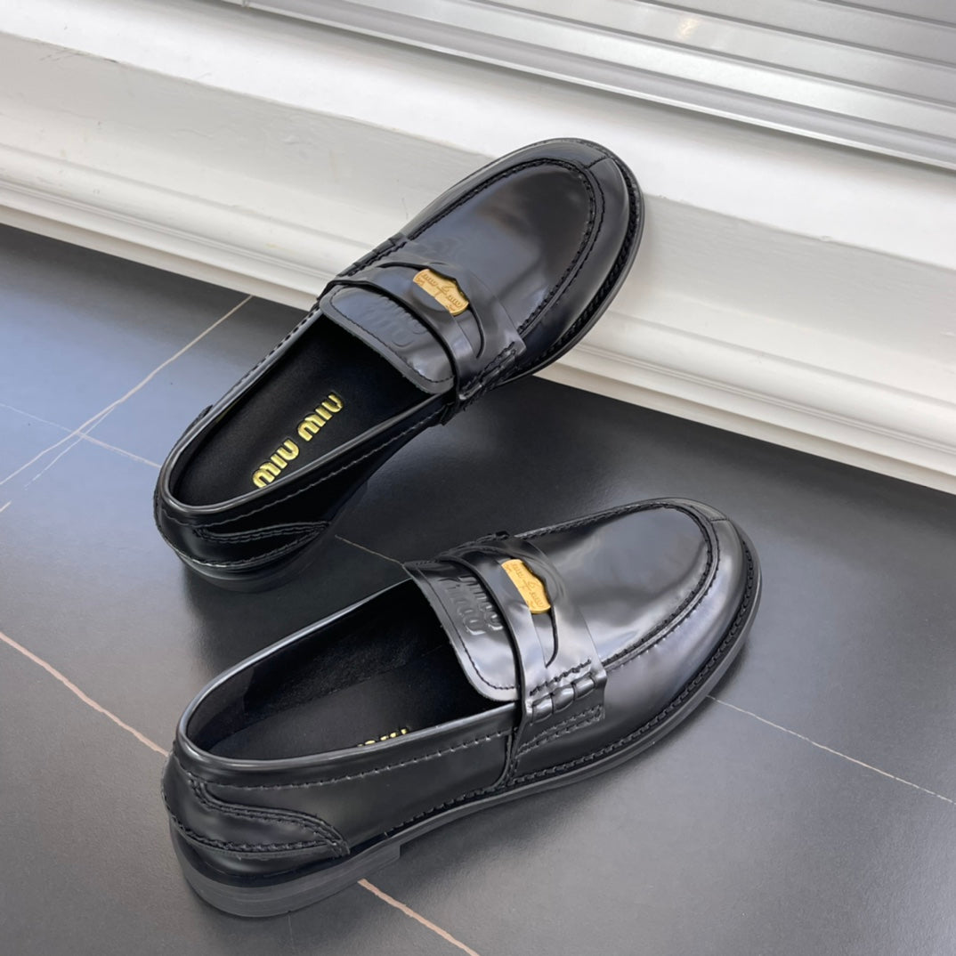 2502004MIU Miu leather penny loafers black suede-brown low heels round toe flat rubber sole